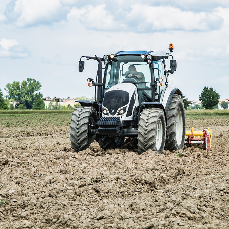 valtra a series tractor on field in mud