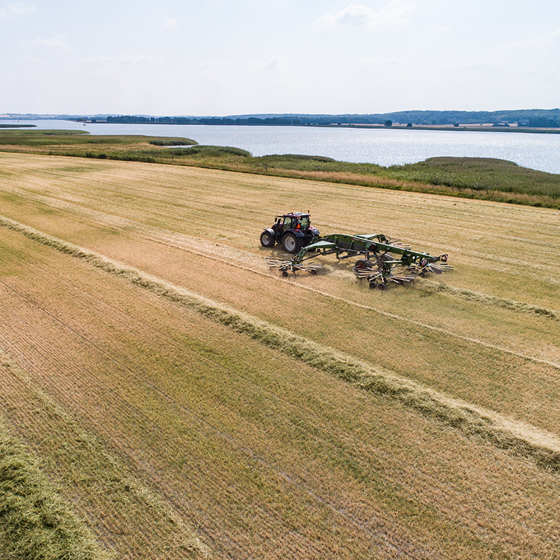 valtra n4 series on a muddy field ploughing with dual wheels