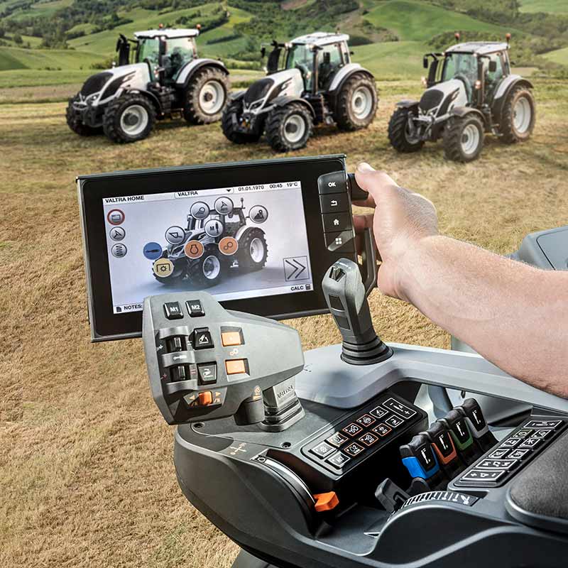 valtra n4, t4, s4 series with smarttouch on a field