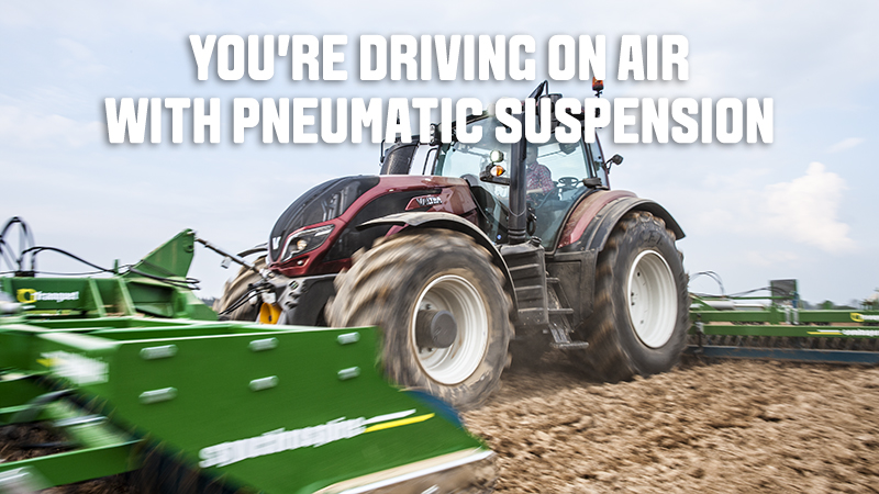 valtra t4 series tractor working on the field